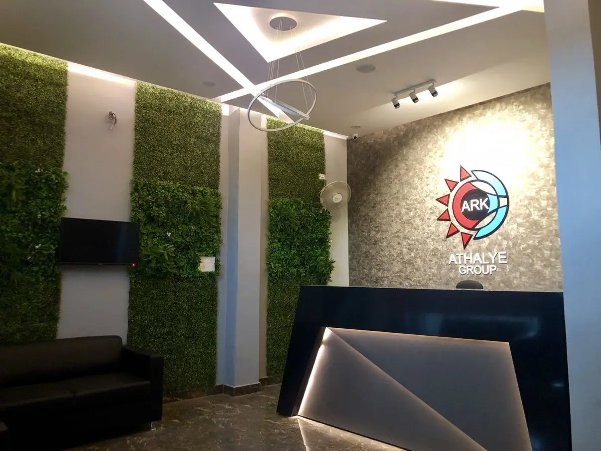 ARK Noise Control reception area with Athalye Group logo